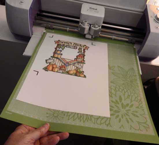 load mat with cardstock
                      to machine